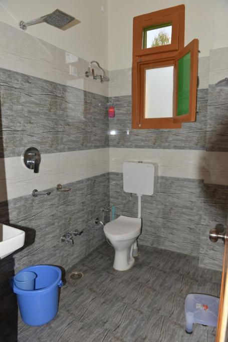Tulip Flowing River View Hotel. Shamshi Ngoại thất bức ảnh